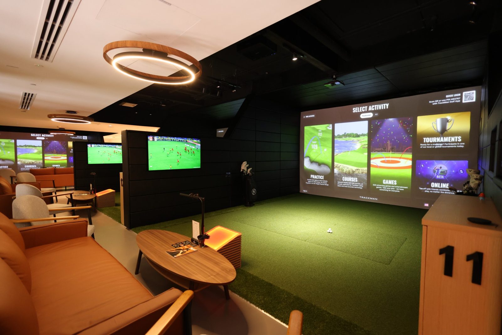 Simulator bays and lounge at Five Iron Golf Dubai Marina