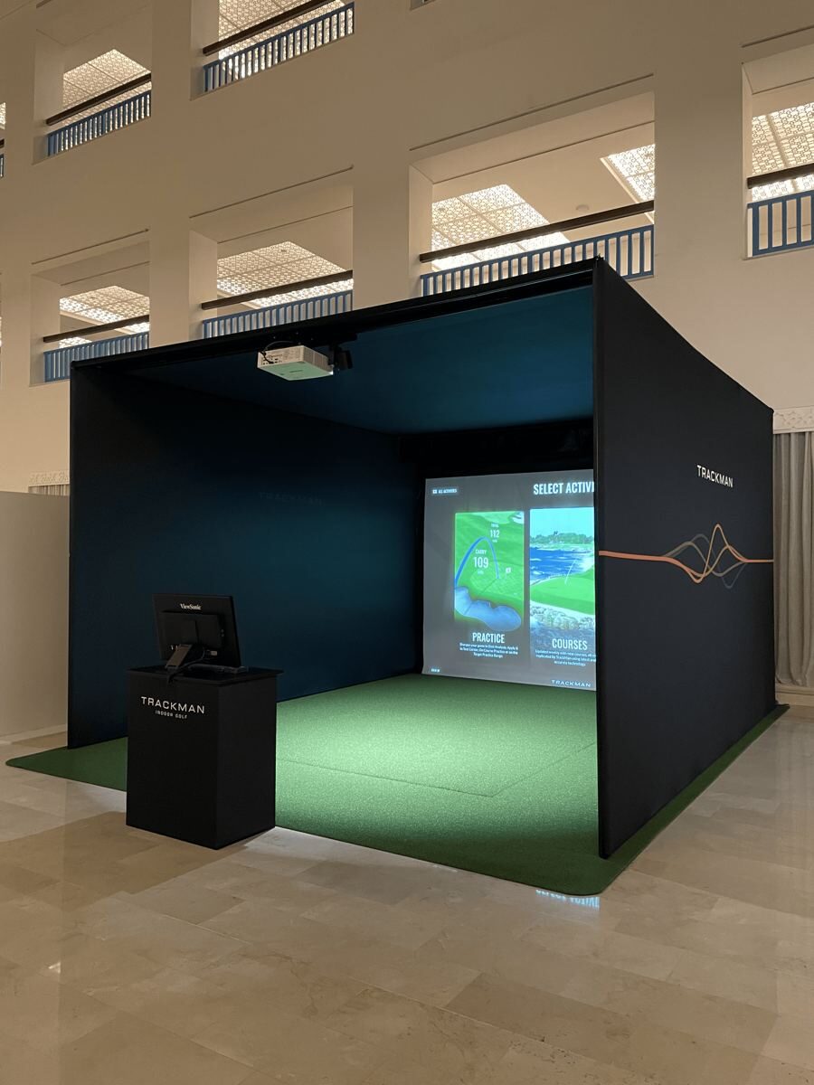 Freestanding Flexcage simulator in a bright atrium